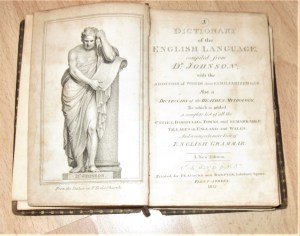 The title page of A Dictionary of the English Language, with an illustration of a statue of Samuel Johnson from St. Paul's Church