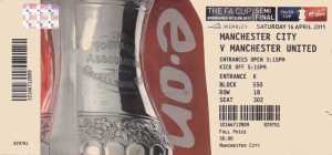 A photograph of Tony's ticket for the Manchester City v Manchester United match at Wembley, which took place on Saturday 16th April 2011 with a 5.15pm kick off. The ticket shows Tony's block, row and seat number and a coloured photograph of the shiny silver Football Association Challenge Cup, with a red background showing the sponsors name, e-on.  The ticket cost  fifty pounds.