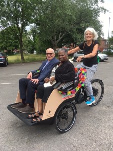 Nouri and Pauline in the trishaw with Sheila